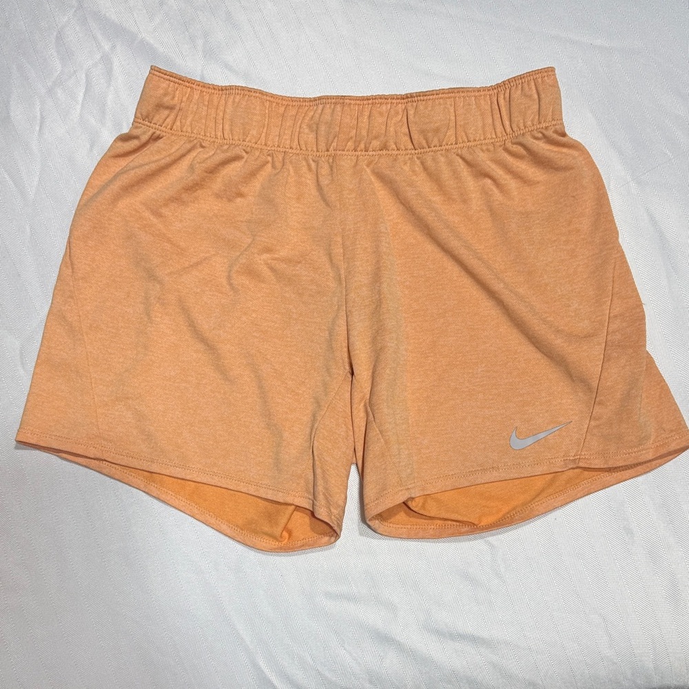 Nike Women's Light Peach Athletic Shorts with Reflective Swoosh